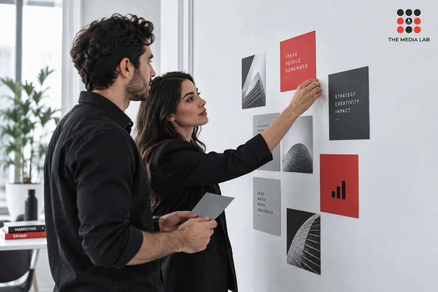 Two strategists arranging campaign cards — editorial illustration for The Media Lab.