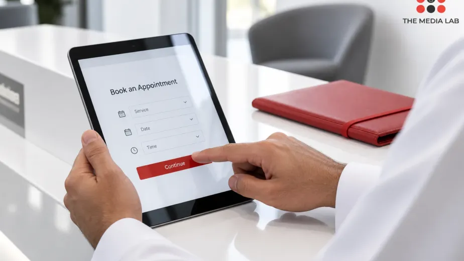 Person using a tablet appointment form, illustrated for The Media Lab’s UAE digital services guide