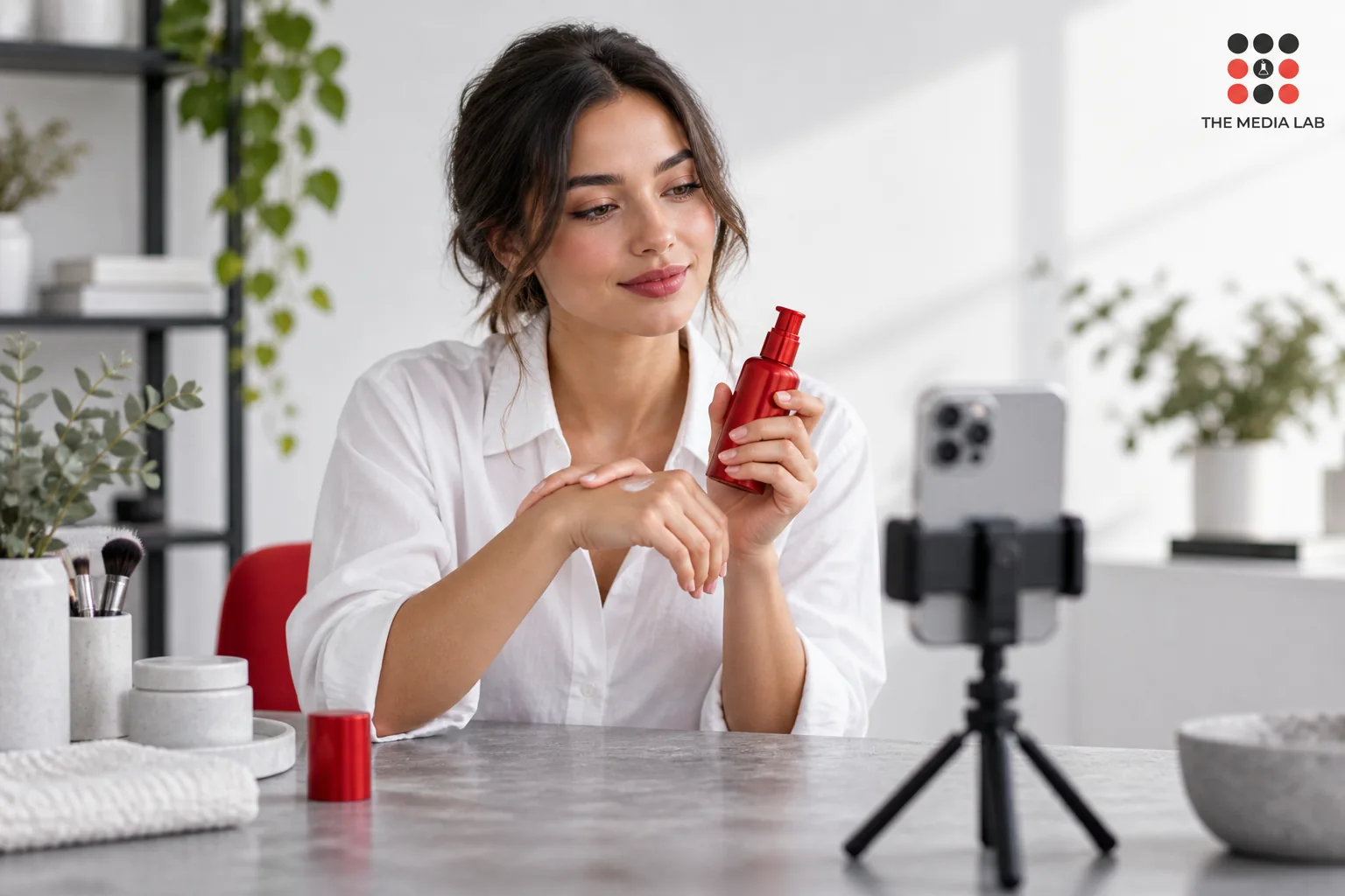 Creator filming a beauty product demonstration, illustrated for The Media Lab’s UAE Instagram influencer guide