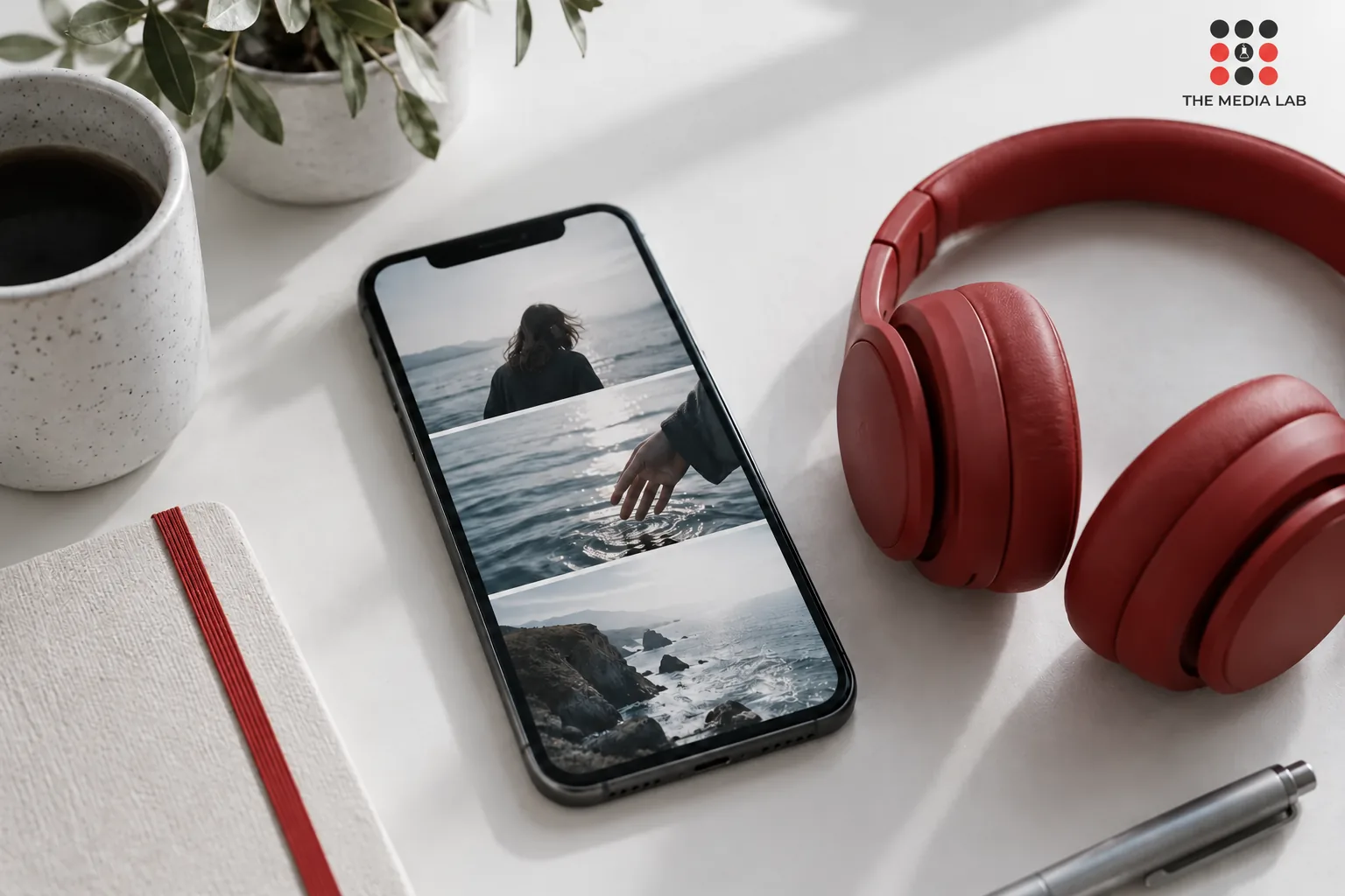 Phone and red headphones illustrating Instagram Stories planning — The Media Lab concept image.